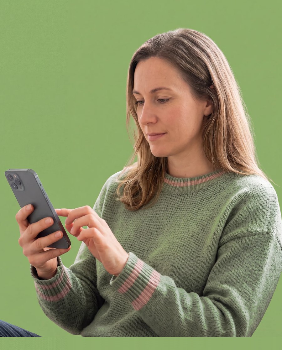 A woman taking the Lifinity assessment on her phone at home